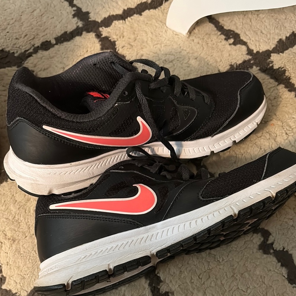 Nike Black and White Sneakers with Pink Swoosh